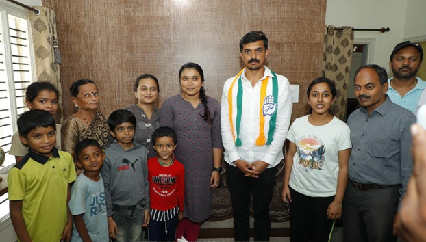 Campaigned for votes on behalf of Congress party by visiting houses in Sanjeevininagar in Moodalapalya ward 127